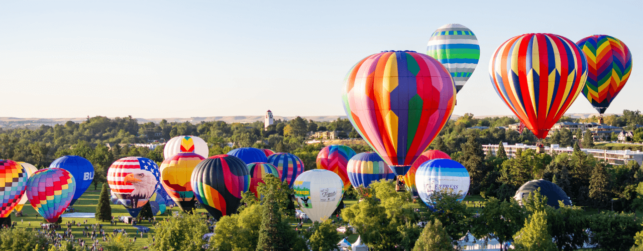 Balloons flying in the skies at the Spirit of Boise Balloon Classic.