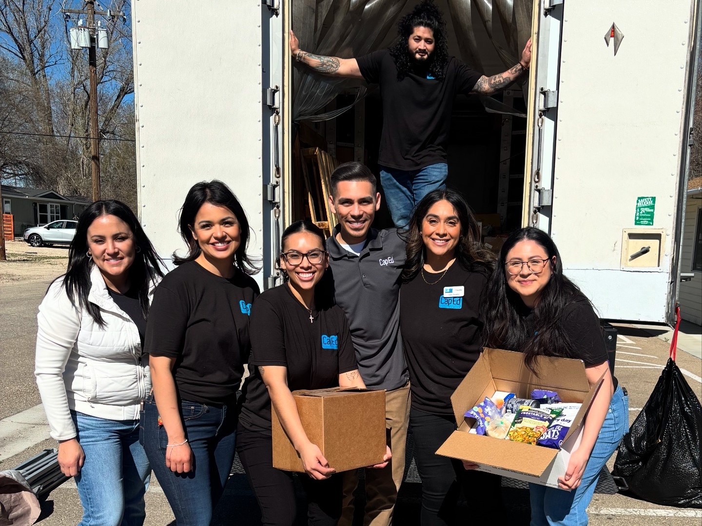 CapEd's Unidos Committee doing volunteer work for the Idaho community.
