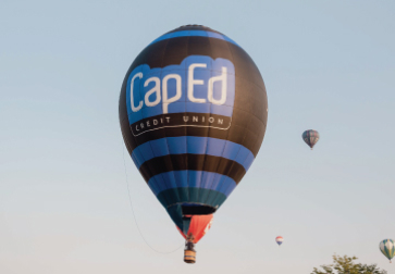 CapEd's Read to Rise hot air balloon in the sky.